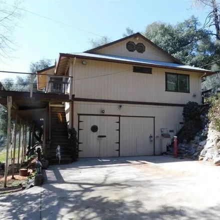 Buy this 4 bed house on 21700 Hunts Road in Cedar Rock Lodge, Sonora