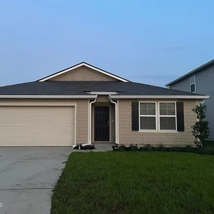 Rent this 4 bed house on 5603 Hollow Birch Dr in Jacksonville, Florida