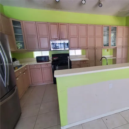 Buy this 3 bed loft on 1005 Corkwood Street in Hollywood, FL 33019
