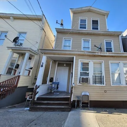 Buy this 8 bed house on 32 Highland Street in Paterson, NJ 07524