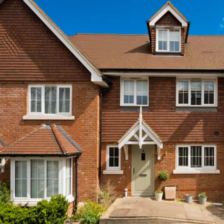 Rent this 4 bed townhouse on Grove Close in Farnham, Surrey