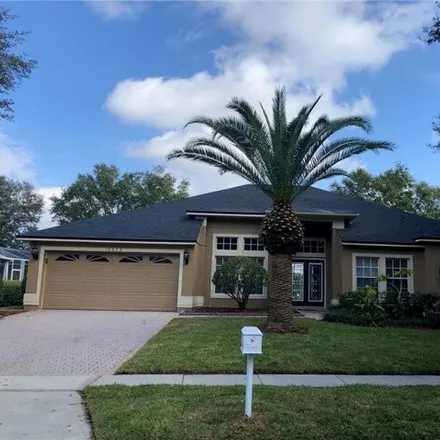 Rent this 4 bed house on 10373 Emerald Woods Avenue in Dr. Phillips, Orange County