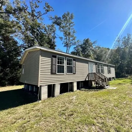 Buy this studio apartment on 11072 Northwest 112 Place in Levy County, FL 32626