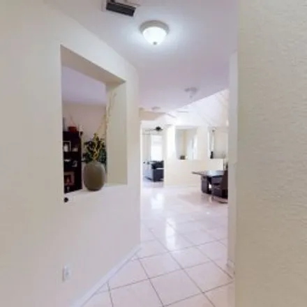 Rent this 4 bed apartment on 11301 Northwest 44Th Ter in Balmoral Lakes, Doral