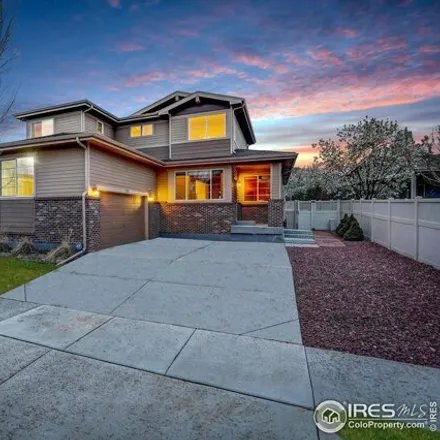Buy this 4 bed house on 1329 Bluemoon Drive in Longmont, CO 80504