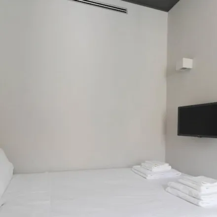 Rent this 1 bed apartment on Enjoy Duomo in Via Flavio Baracchini, 9