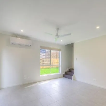 Rent this 3 bed townhouse on Lamington Drive in Redbank Plains QLD 4301, Australia
