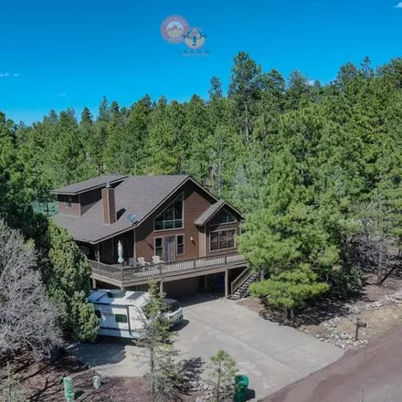 Buy this 4 bed house on 726 Pine Village Lane in Pinetop-Lakeside, Navajo County