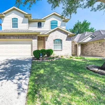 Rent this 4 bed house on 2410 Keegan Hollow Ln in Spring, Texas