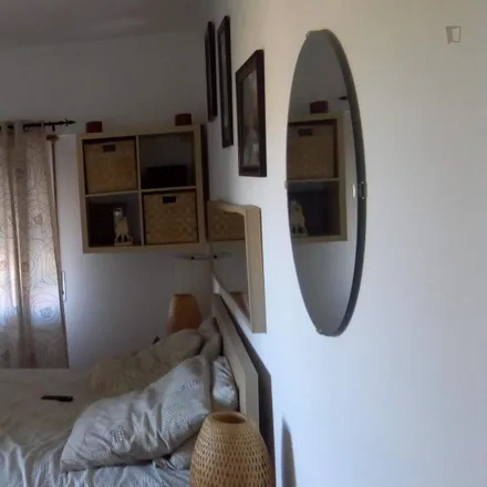 Rent this 2 bed room on Estrada da Póvoa in 1750-478 Lisbon, Portugal