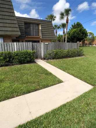 Rent this 2 bed townhouse on 4515 45th Way in West Palm Beach, FL 33407