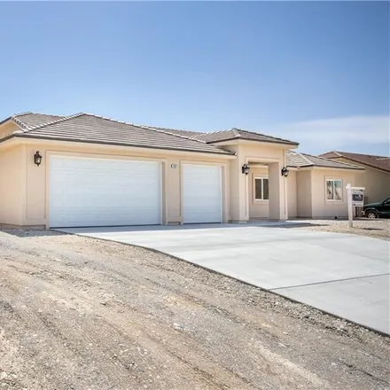 Buy this 4 bed house on 6665 Raintree Court in Pahrump, NV 89061