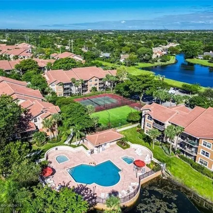 Buy this 1 bed condo on Wiles Road in Coral Springs, FL 33065