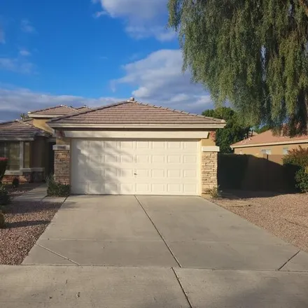 Rent this 3 bed house on 13406 West Port Royale Lane in Surprise, AZ 85379