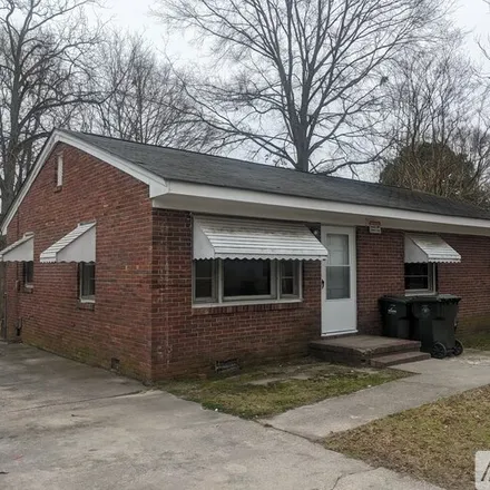 Rent this 3 bed house on 1115 Woodrow St S