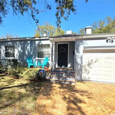 Rent this 3 bed house on Northumberland Avenue in Orlando, FL 32804