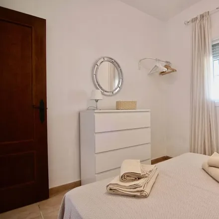 Rent this 4 bed house on Plenoil Chiclana de la Frontera II in Avenida de los Descubrimientos, 35