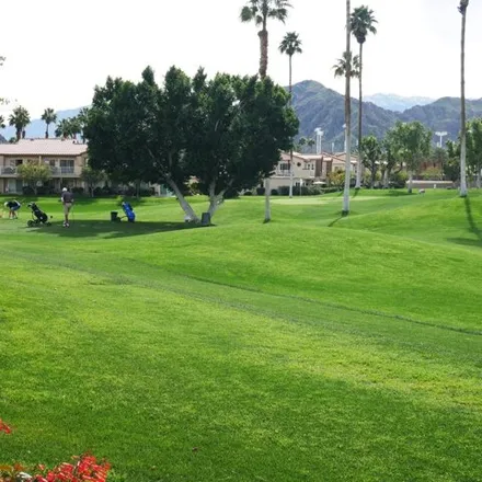 Buy this 2 bed condo on Emerald Drive in La Quinta, CA