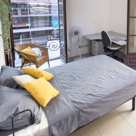 Rent this 7 bed room on Via Laietana in 08001 Barcelona, Spain