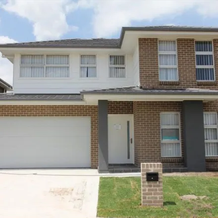 Rent this 4 bed apartment on 21B Bega Street in Gregory Hills NSW 2557, Australia
