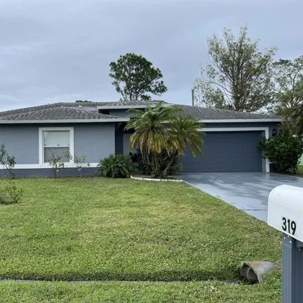 Rent this 3 bed house on 327 Northwest Byron Street in Port Saint Lucie, FL 34983