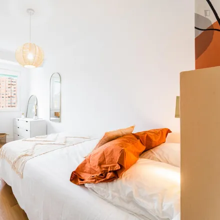 Rent this 4 bed room on Carrer de Joan Mercader in 12, 46011 Valencia