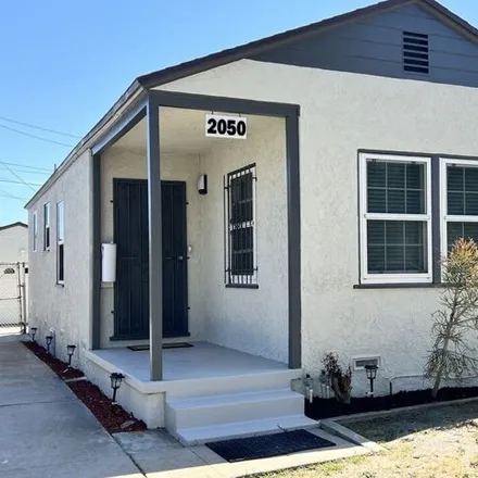 Rent this 3 bed house on 2070 West 104th Street in Los Angeles, CA 90047