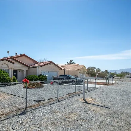 Buy this 2 bed house on 2401 Ambush Street in Pahrump, NV 89048