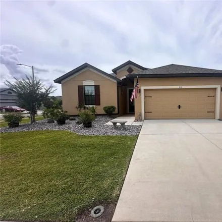 Buy this 4 bed house on Old Windsor Way in Spring Hill, FL 34909