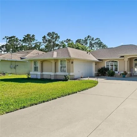 Buy this 3 bed house on 72 Walton Place in Palm Coast, FL 32164
