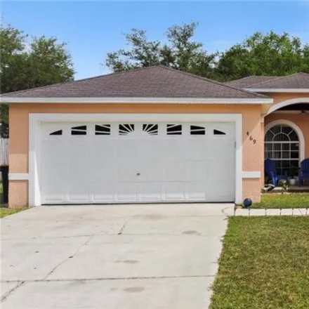 Buy this 4 bed house on 477 Dove Drive in Polk County, FL 34759