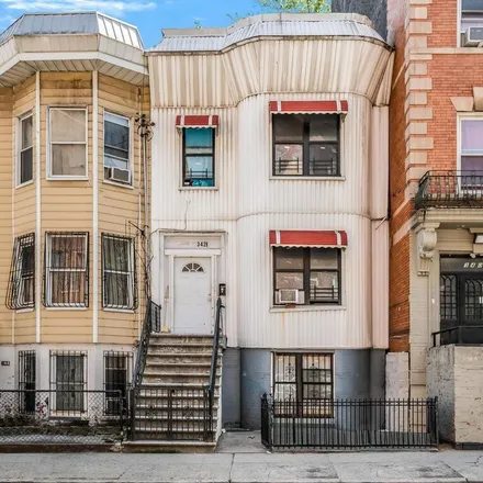 Buy this studio townhouse on 348 East 194th Street in New York, NY 10458