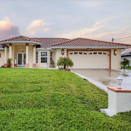 Buy this 4 bed house on 3564 Southwest 8th Place in Cape Coral, FL 33914