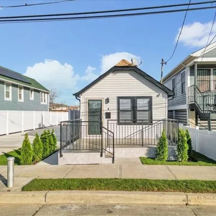 Buy this 3 bed house on 446 Beach 45th Street in New York, NY 11691