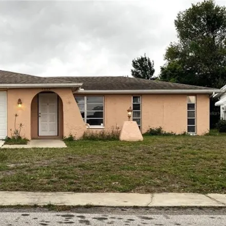 Buy this 3 bed house on 7480 San Carlos Drive in Jasmine Estates, FL 34668