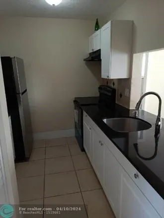 Rent this 2 bed condo on Windsor Court in Fort Lauderdale, FL 33304