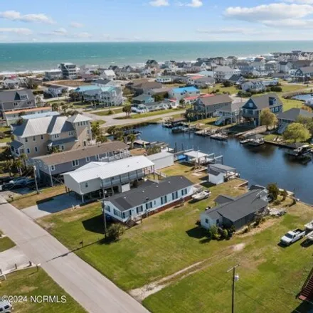 Buy this studio apartment on 6023 6th Street in Surf City, NC 28445
