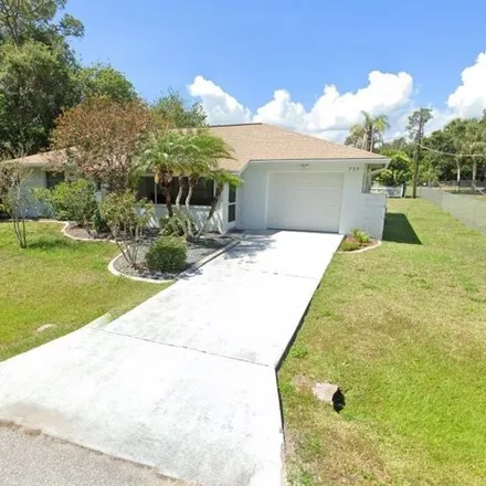 Rent this 2 bed house on 725 Merrick Ln Nw in Port Charlotte, Florida