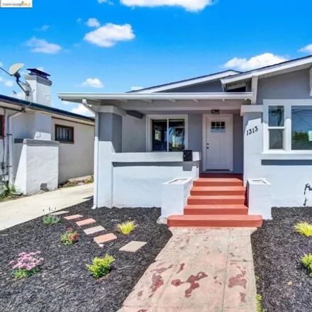 Buy this 2 bed house on 1313 58th Ave in Oakland, California