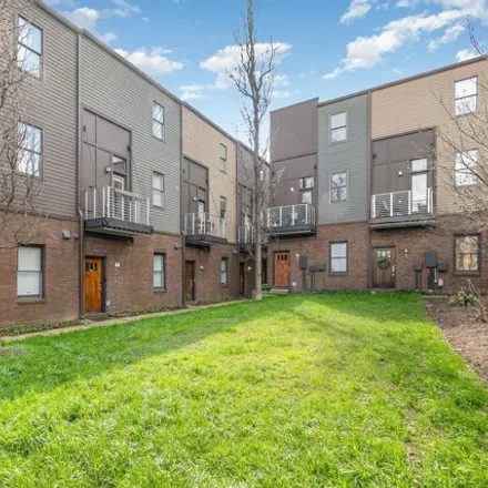 Buy this 2 bed townhouse on Pieces Boutique in Madison Street, Nashville-Davidson