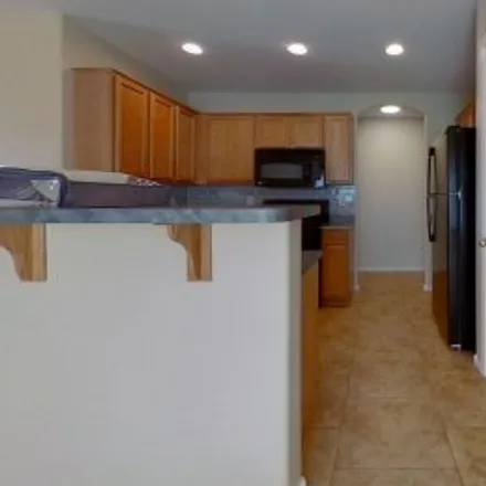 Rent this 4 bed apartment on 23009 West Cocopah Street in Sundance, Buckeye