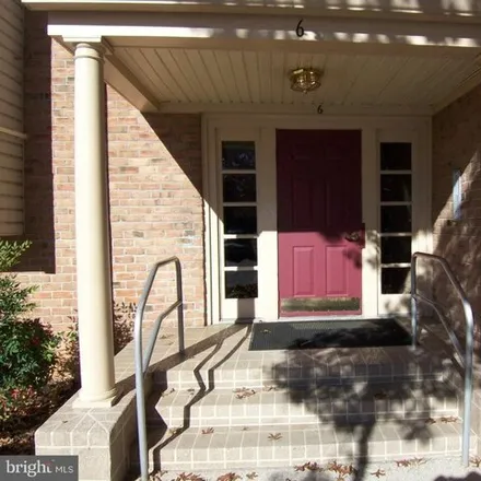 Rent this 3 bed condo on 6 Cloverwood Court in Essex, MD 21221