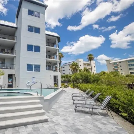 Rent this 4 bed condo on Smuggler's Cove Adventure Golf in 19463 Gulf Boulevard, Indian Shores