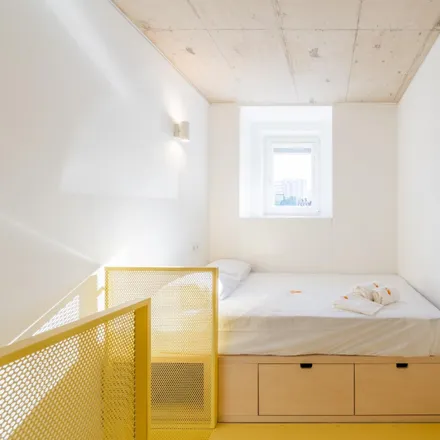Rent this 4 bed room on Rua das Palmeiras in 1600-177 Lisbon, Portugal