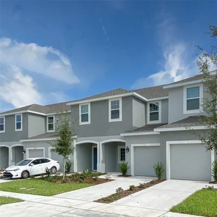Rent this 3 bed townhouse on Salt Grove Street in Orange County, FL 32862
