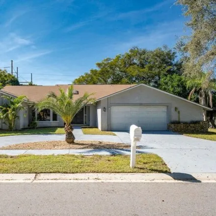 Image 1 - 185 Normandy Circle West, Palm Harbor, FL 34683, USA - House for sale