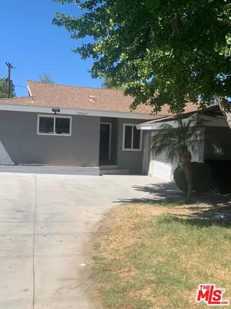 Rent this 4 bed house on 19847 Arminta Street in Los Angeles, CA 91306
