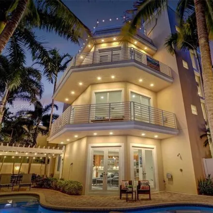 Rent this 5 bed house on 3253 Northeast 15th Street in Country Club Isles, Pompano Beach