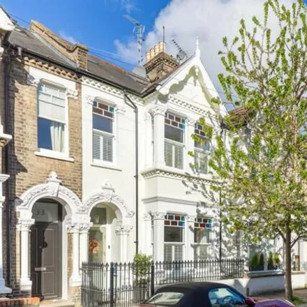 Buy this 4 bed townhouse on Longbeach Road in London, SW11 5ST