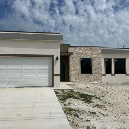 Buy this 3 bed house on 219 Northwest 23rd Terrace in Cape Coral, FL 33993